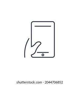 Smartphone in hand. Mobile phone. Vector linear icon isolated on white background.