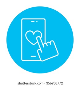 Smartphone with heart sign line icon for web, mobile and infographics. Vector white icon on the light blue circle isolated on white background.