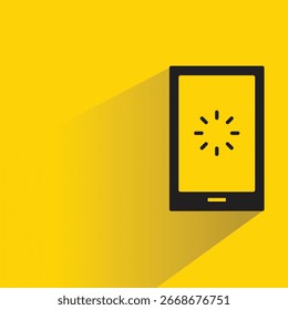 Smartphone y carga con sombra sobre fondo amarillo