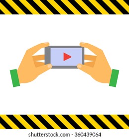 Smartphone with media player sign