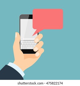 Smartphone with message. Isolated hand holding smartphone with blank template message bubble on white background.