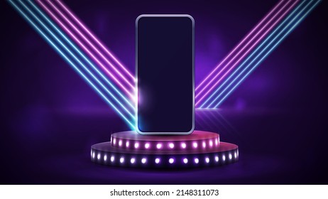 Smartphone on podium with bulbs in empty purple scene with diagonal pink and blue line neon lamps on background.