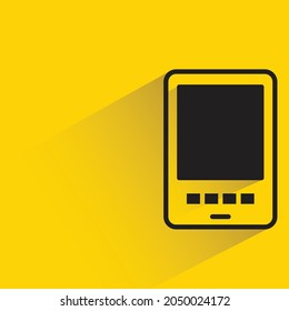 smartphone with shadow on yellow background