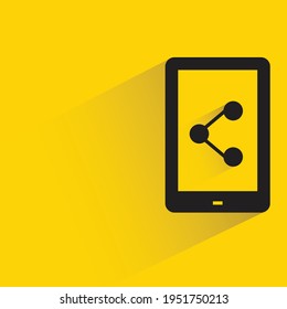 smartphone and share with shadow on yellow background