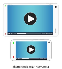 smartphone and tablet with media playing on a screen