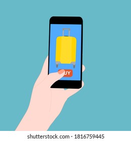 Smartphone with travel luggage and buy button on the screen.  Contactless online purchase of goods using your phone.  Diseases prevention. Home deliVery.​ Vacation,  tourism concept