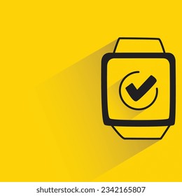 smartwatch and check mark with shadow on yellow background