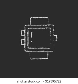 Smartwatch hand drawn in chalk on a blackboard vector white icon isolated on a black background.