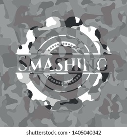 Smashing written on a grey camouflage texture