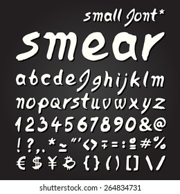 Smear hand painted small letters font for seasonal posters or other works on blackboard background