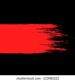 smear of red paint on a black background