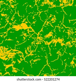 smeared yellow paint. abstract spots. green background. grunge texture.
