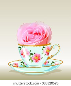 Smell flower with rose in a teacup