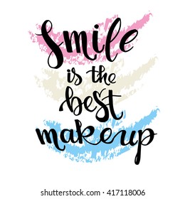 Smile is the best makeup. Inspirational quote handwritten with black ink and brush, custom lettering for posters, t-shirts and cards. Vector calligraphy isolated on colorful background.