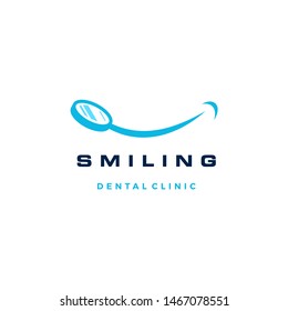 smile dental mirror logo vector icon illustration