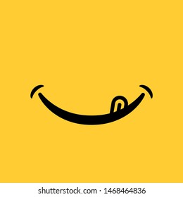 smile emoticon with tongue on yellow background
