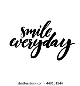Smile everyday. Black saying on white background. Brush lettering, positive quote.