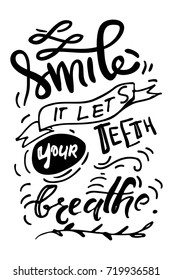 Smile, it let's your teeth breathe.Typography lettering design on a tooth shape grunge texture and sunburst for print, t-shirt. 