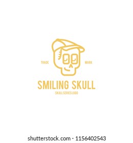 Smile skull golfer hat gold monoline logo