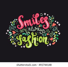 Smiles are always in fashion. Inspirational quote handwritten. Vector lettering for posters, t-shirts and cards. 