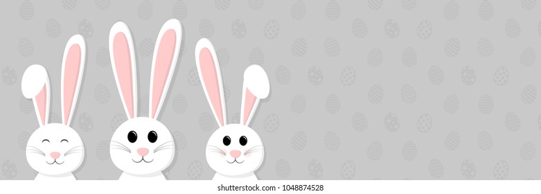 Smiley bunnies on background with eggs and copyspace. Easter concept. Vector.