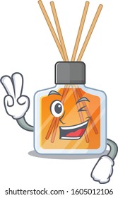 Smiley mascot of air freshener sticks cartoon Character with two fingers