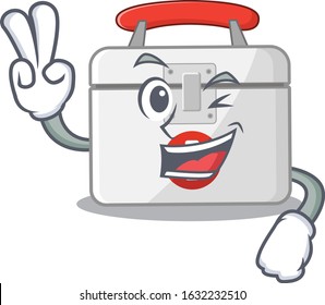 Smiley mascot of first aid kit cartoon Character with two fingers