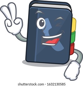 Smiley mascot of phone book cartoon Character with two fingers