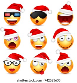 Smiley,emoticon set. Yellow face with emotions and Christmas hat. New Year, Santa.Winter emoji. Sad,happy,angry faces.Funny cartoon character.Mood. Vector.