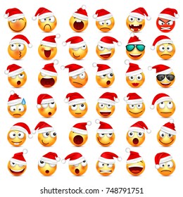 Smiley,emoticon set. Yellow face with emotions and Christmas hat. New Year, Santa.Winter emoji. Sad,happy,angry faces.Funny cartoon character.Mood. Vector.