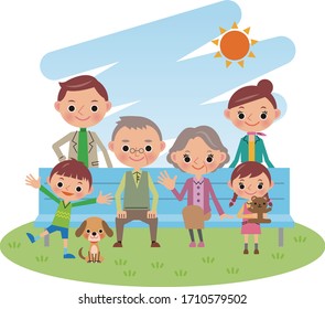 A smiling 3 generation family and a dog sit on a bench