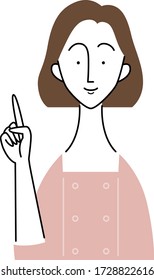 a smiling aesthetician who is in uniform / pointing gesture