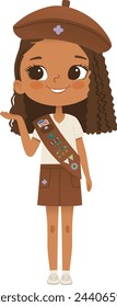 Smiling African American girl scout wearing sash with badges isolated on white background. Female scouter, Brownie ligue Scout Girls troop