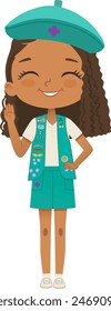 Smiling African American girl scout wearing vest with badges isolated on white background. Junior ligue Scout Girls troop