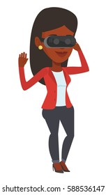 Smiling african-american gamer wearing virtual reality headset. Young happy woman using virtual reality glasses and playing videogame. Vector flat design illustration isolated on white background.