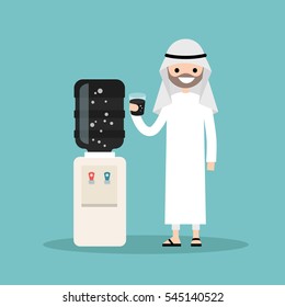 Smiling arabic businessman wearing national costume and drinking oil from the water cooler / editable vector cartoon, clip art