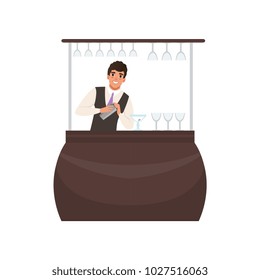 Smiling bartender mixing a cocktail drink in shaker at the bar counter, barman character at work cartoon vector Illustration on a white background