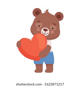 Smiling Bear Character Holding Red Heart in His Paws Vector Illustration
