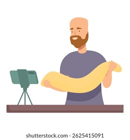 Smiling bearded man in a casual shirt live streaming while cooking with a large baguette