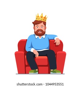 Smiling bearded man pretending to be a modern king wearing gold crown sitting on home arm chair throne. Egotistical fantasy of successful boss. Flat style isolated vector character illustration