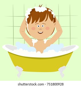 Smiling beautiful baby boy bathing in bathtub with shower at home