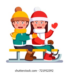 Smiling boy and girl kids sitting on sled together in winter outdoors. Little siblings or friends enjoying sledding and waving hand in welcoming gesture. Flat style vector isolated illustration.