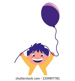 smiling boy holding balloon