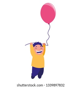 smiling boy holding balloon