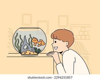 Smiling boy looking at golden fish in aquarium. Cute small child look at goldfish in tank. Hobby and childhood. Vector illustration. 