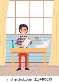Smiling boy making paper origami during creativity or schooler development lesson. Crafts classes for children and adults. Cartoon style handmade paper bird on desk. Craft hobby or profession