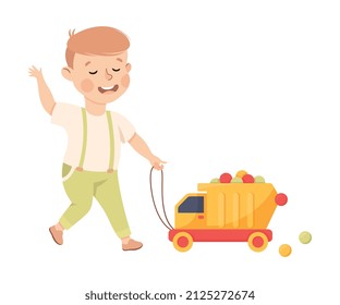 Smiling Boy Pulling Toy Truck with Colorful Balls Playing and Having Fun Vector Illustration