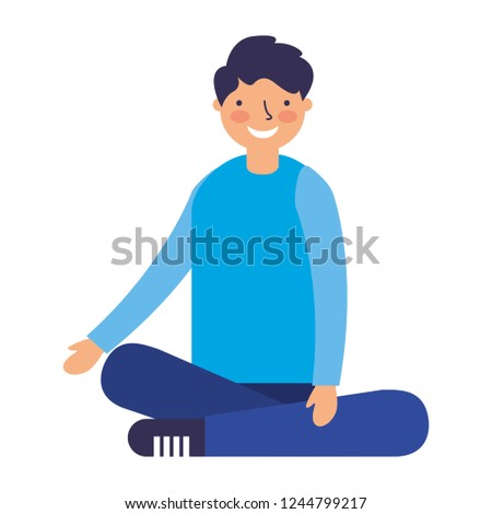 smiling boy sitting crossed legs