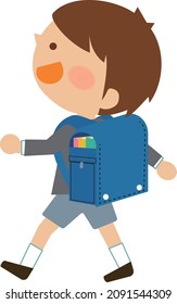 A smiling boy walking with a school bag on his back