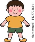 Smiling boy in a yellow T-shirt